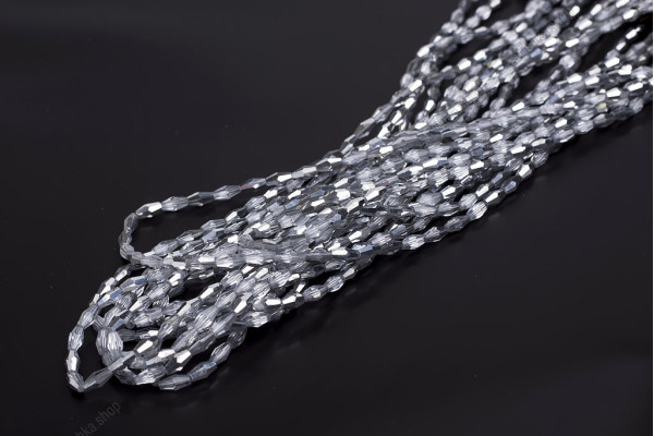 Намистини кришталеві Біконус довгий 4x8мм, +/-65шт./нит. №115 White Silver on Crystal