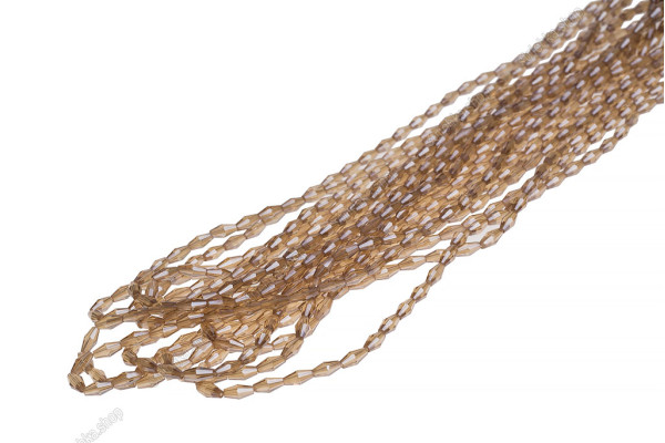 Намистини кришталеві Біконус довгий 4x8мм, +/-65шт./нит. №128 Golden Amber on Crystal